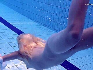Russian hottie Elena Proklova swims naked in the pool