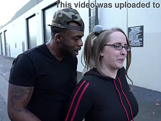 Andi Ray gets her pig tails pulled while sucking a big black cock