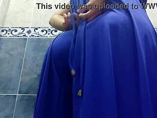 A Latina mother-in-law with a big booty gets naughty in a public restroom
